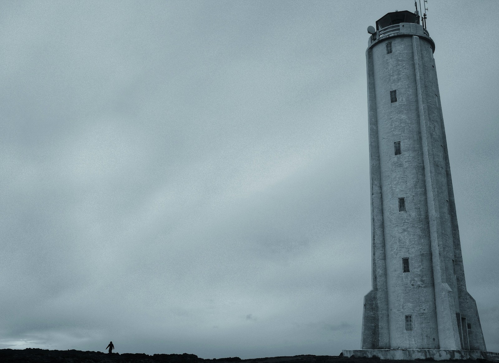 rule of thirds photography of gray lighthouse
